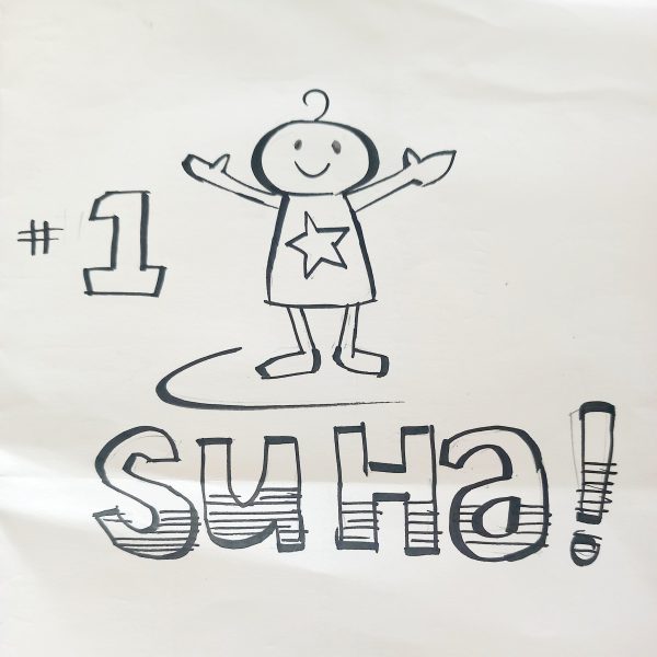 Wee graphic figure announcing 'Su Ha!' with #1 to side